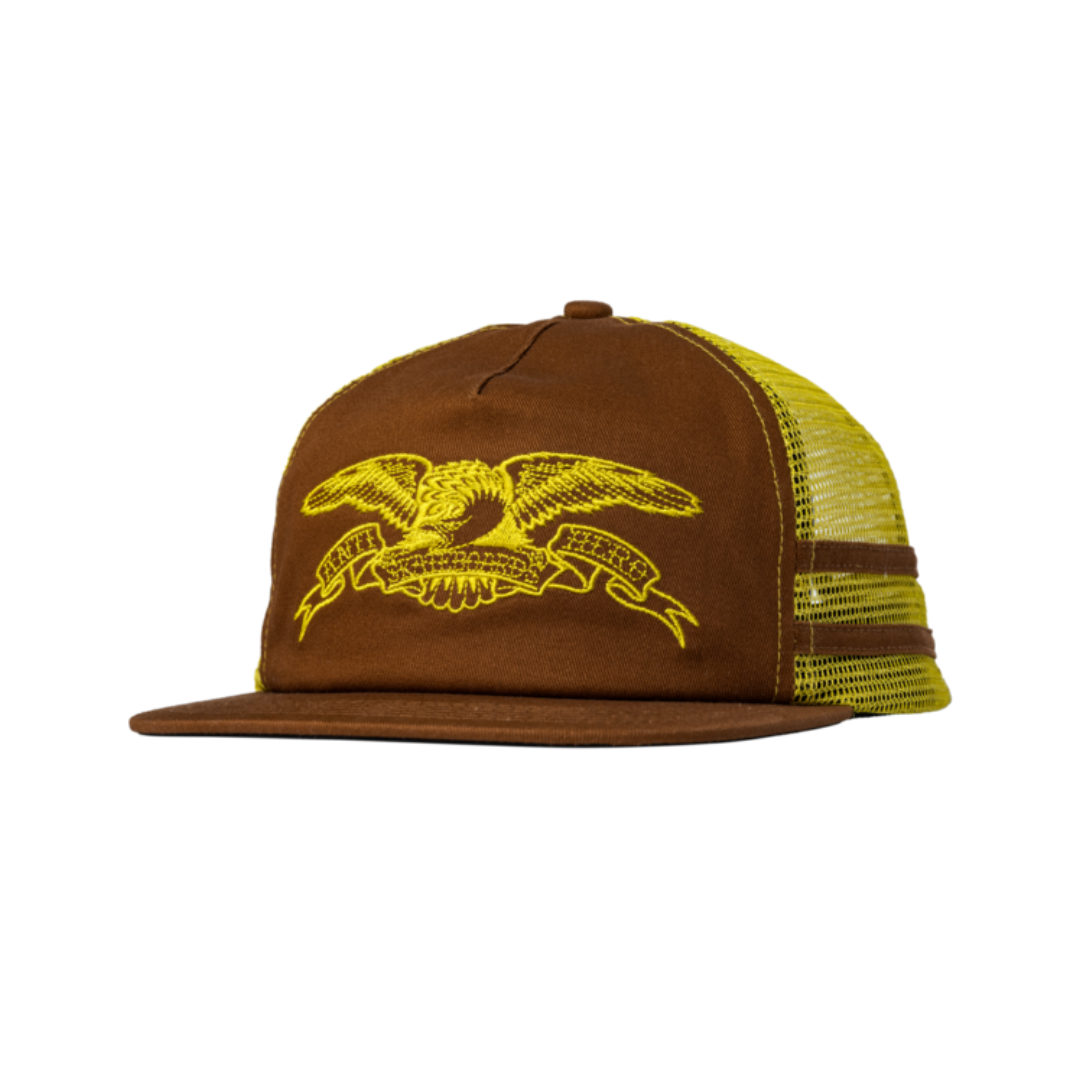 Brown trucker cap with yellow eagle emblem on a white background