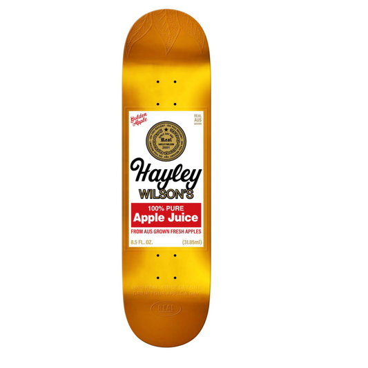 Skateboard deck with Hayley Wilson's Apple Juice label design on a white background